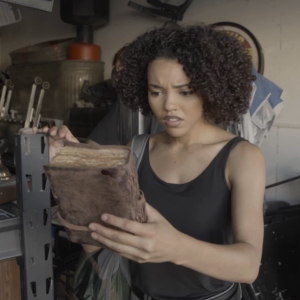 Charlie (Trinity Swearington) discovers a  strange journal