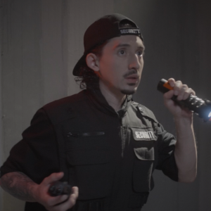 Security guard Alvarez (Oscar Antonio Damasco) joins the rescue